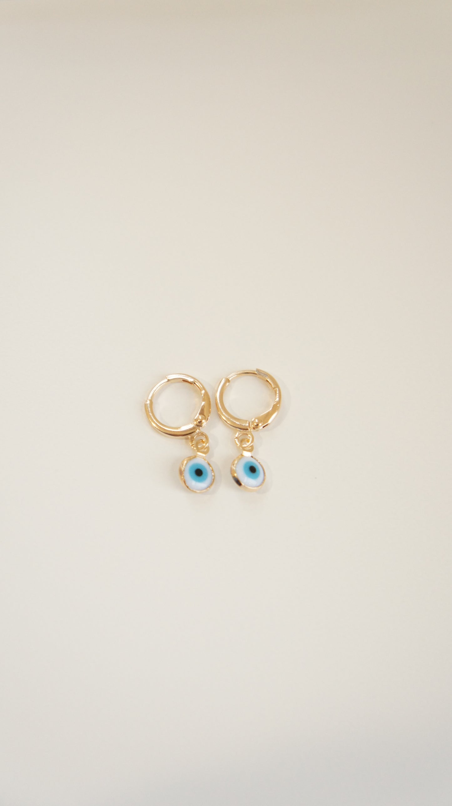 Round Tiny Eyes Earrings
